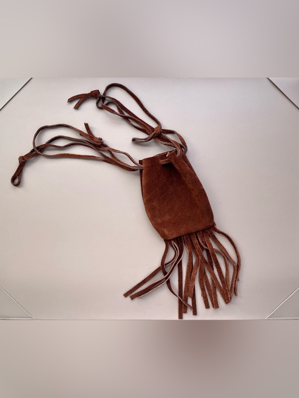 Suede Fringe Drawstring Pouch in Rich Brown